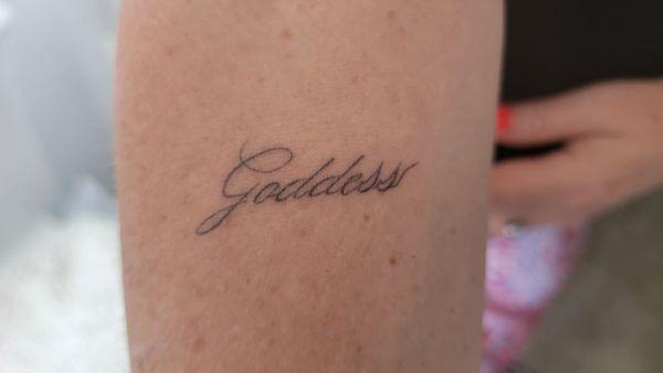 Goddess tattoo on my inner right arm under the crease of my elbow bend