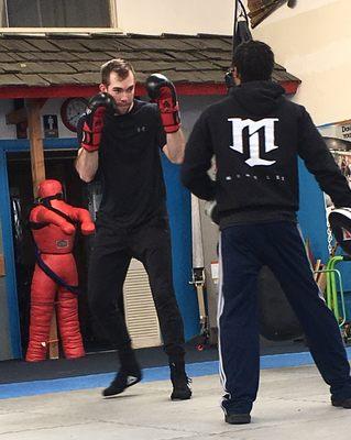 Boxing training with coach Mike Lee.