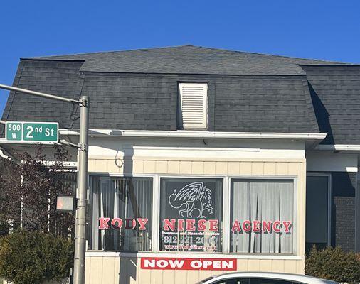 View of the agency at the intersection of Rogers and 2nd St.