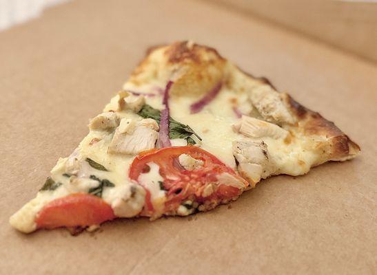 The GREAT WHITE PIZZA. Customized: remove feta, add tomato, onion, basil, chicken and fresh mozzarella