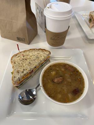 Coffee(breve), soup(cabbage, kielbasa, potato), sandwich(turkey cranberry) and scones(savory cranberry) dine in and goat cheese) to go