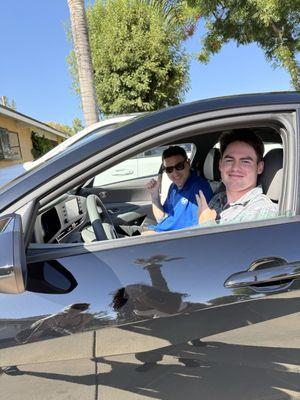 Zach and my bf in his new car