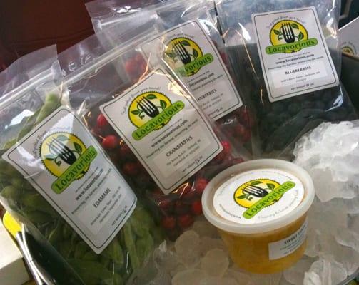 Locally grown & frozen fruits and veggies for sale at the Ann Arbor Farmers Market in December.