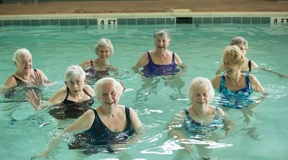 Woodcrest Villa residents enjoy an aqua zumba class, one of many activities offered.