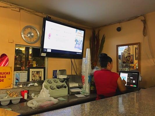 The order counter and friendly server