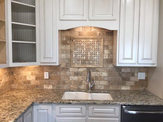Basketweave mosaic with chair rail trim over tumbled tile--and new Granite Countertops