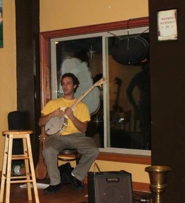 Playing the banjo at E Street Cafe in Encinitas, CA