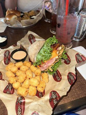 CHICKEN SANDWICH lettuce wrapped and added crispy onions.