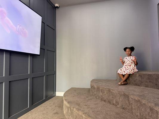 Watching a movie while we wait !