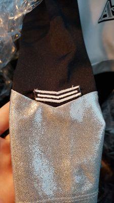 Crooked patch, the edges aren't sewn down either.