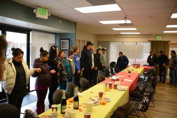 Bringing Thanksgiving dinners to families at Monument Impact