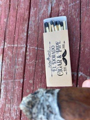 Complimentary matches with cigar.