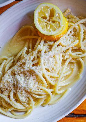 Our Spaghetti Limone is a beautifully balanced dish of al dente pasta tossed in a silky lemon-butter sauce, kissed with Parmesan
