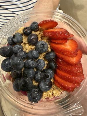 Delicious Dragon Power Bowl - Dragon fruit base topped with granola, strawberries, blueberries, & honey