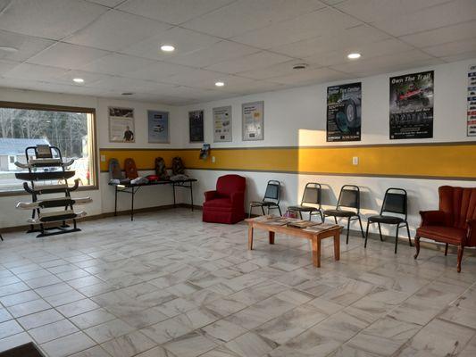 Bright, clean and comfortable waiting area with free coffee, pop and water.