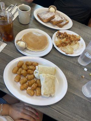 Breakfast burrito, pancake, French toast and hash browns