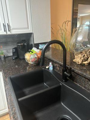 My awesome new black sink and faucet- looks amazing and the finishing touch to my kitchen