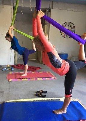 Balance and strength but it's actually not that hard because the silks help you.
