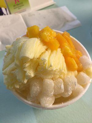 Delicious mango shaved ice with fresh mango chunks and mochi.
