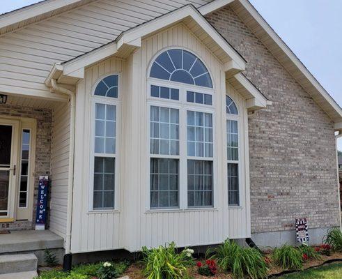 Schneider's garden windows provide abundant light for year-round indoor gardening.