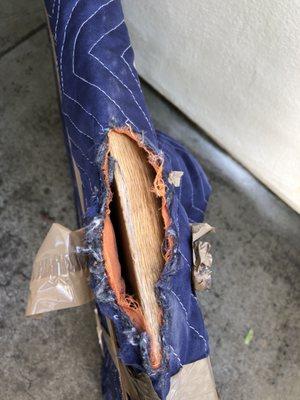 This is our dining room table that was clearly dragged on the ground and damaged.