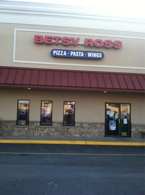 Outside of the restaurant, in the liberty plaza shopping center