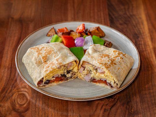 Ham Burrito, beans, eggs with ham, pico de Gallo, avocado ;side potatoes