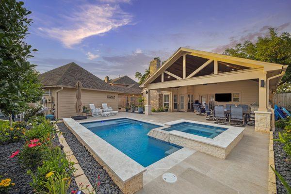 Covered patio with a pool in Sugar Land TX