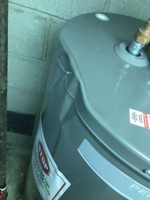 Dented water heater