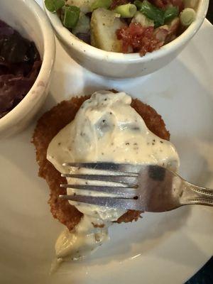 The so called schnitzel and a fork for reference of size,