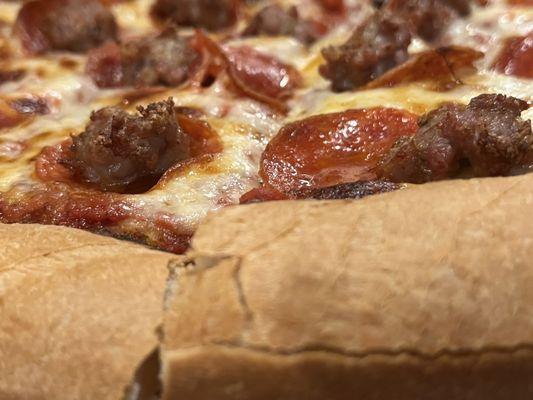 Sausage and pepperoni pizza