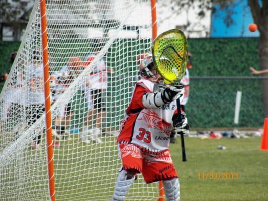 U9 fearless goalie acting like a brick wall