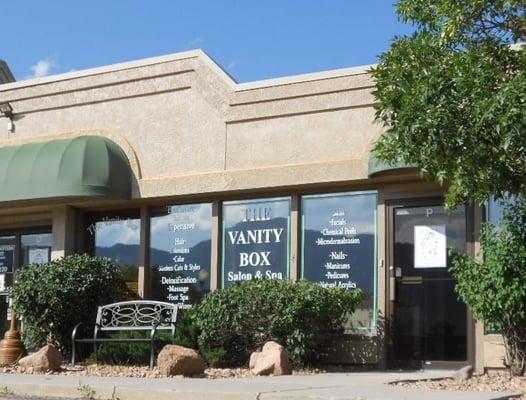 Salon store front.
West End Center - 755 Highway 105 - Suites O & P - Palmer Lake, CO.
Notice the mountains in the windows....