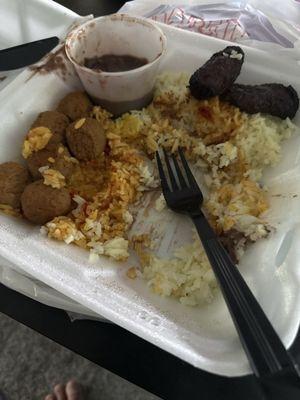 Meatballs with rice and beans and sweet plantains.