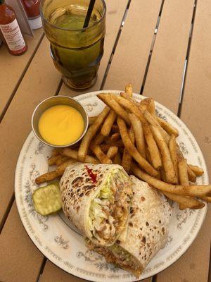 Chipotle chicken wrap with cajun cheese fries. Mango Peach Matcha Tea