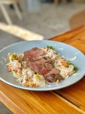 Steak & Ravioli Bianco* sliced Filet Mignon(extra), shrimp, crispy onions, grana padano, truffle beurre blanc sauce