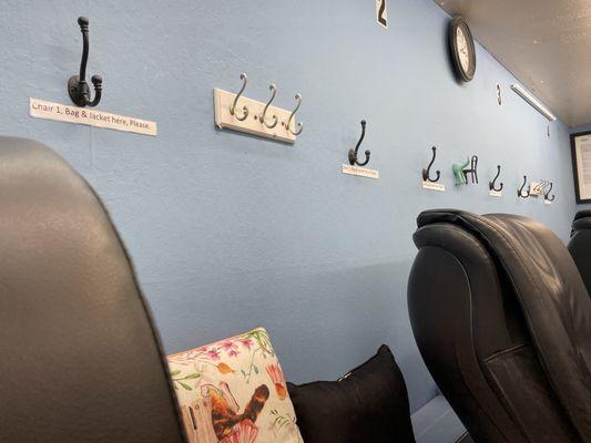 Hooks for jackets and bags by the spa pedi chairs