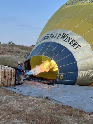 Hot air going into the balloon