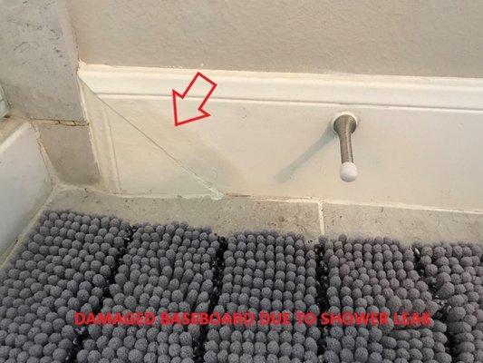 Damaged baseboard due to leaking shower