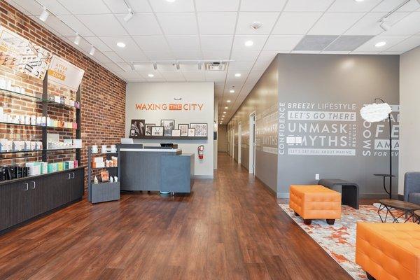 Lobby, hallway, and waiting area view for Waxing The City in Cedar Park.