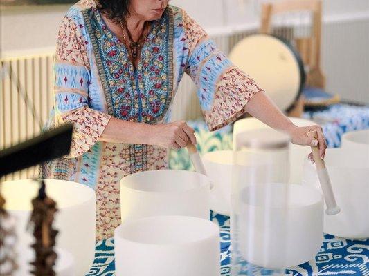 Playing the crystal singing bowls