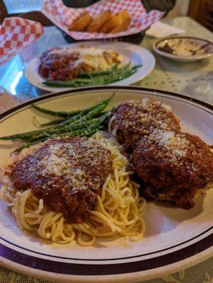 Eggplant Parmesan, special of the day, with the sides of spaghetti & green beans. Not shown was the salad and minestrone soup.