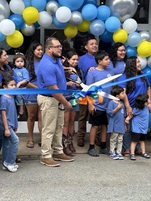 Cutting the ribbon. Grand Opening