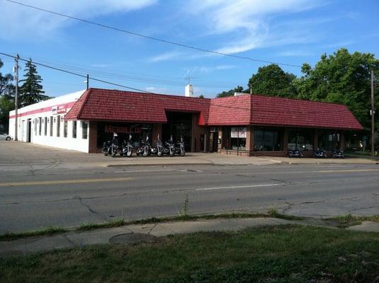 Across from Pine Tree Heating and next door to ACO Hardware on old M-21 three blocks east of M24.