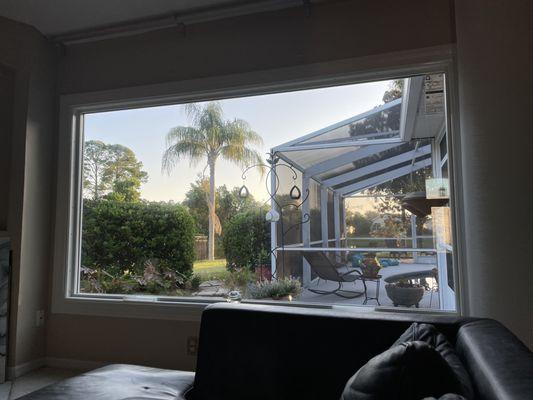 Large window in living room that replaced 3 sliding windows.