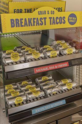 photo shows merchandiser filled with Tacodeli breakfast tacos, available from 6:30am - 3:00pm daily