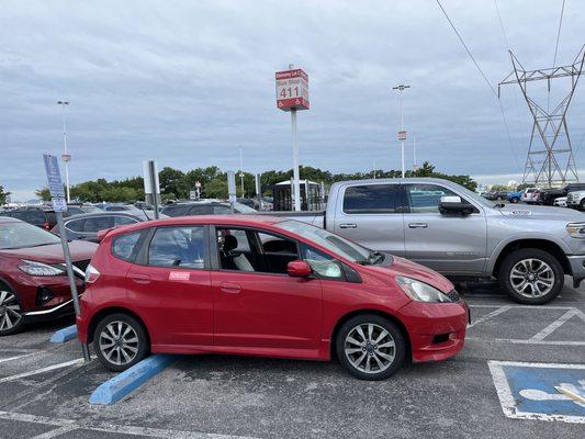 My car near Bus Stop #411 at Nashville airport parking.
