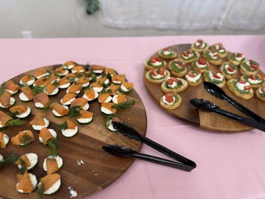 Appetizers - lox on cucumber with fresh dill, and crostini with pesto and fresh cream - super yummy