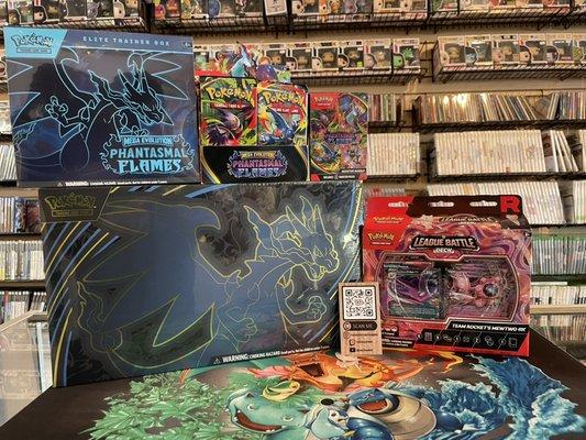 Pokémon restock. Check out our local card shop. We buy and trade depending on the cards. TCG trading cards charizard UPC