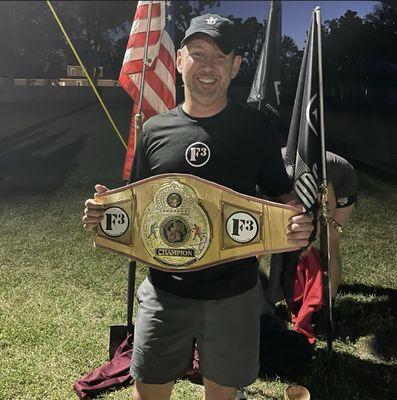 Flo, our founder, after winning the award for being the Highest Impact Man in our group!